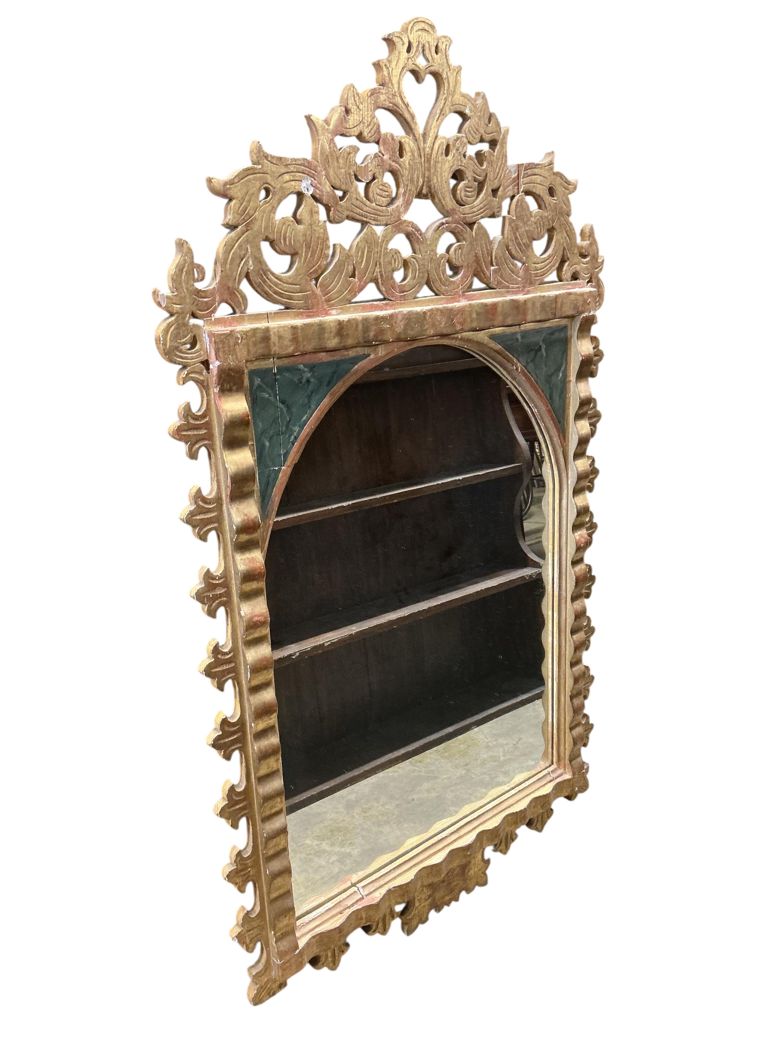 A pair of Italian painted carved giltwood wall mirrors, width 72cm, height 125cm